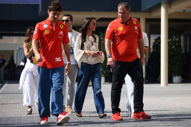 December 6, 2024, Abu Dhabi, United Arab Emirates: Charles Leclerc of Ferrari and his girlfriend Alexandra Saint Mleux arrive in the paddock ahead of Formula 1 Abu Dhabi Grand Prix at Yas Marina Circuit on December 6th, 2024 in Abu Dhabi, United Arab Emirates. Abu Dhabi United Arab Emirates - ZUMAz156 0783530357st Copyright: xBeataxZawrzelx