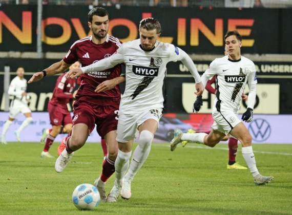 06.12.2024, xmohx, Fussball 2.Bundesliga, SV Elversberg - 1.FC Nürnberg emspor, v.l. Julian Justvan (Nürnberg), Frederik Schmahl (Elversberg) (DFL DFB REGULATIONS PROHIBIT ANY USE OF PHOTOGRAPHS as IMAGE SEQUENCES and or QUASI-VIDEO) Elversberg