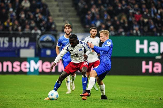 Bakery Jatta (Hamburger SV, 18), Andreas Mueller (SV Darmstadt 98, 16) GER, Hamburger SV vs. SV Darmstadt 98, Fussball, 2. Bundesliga, Spieltag 15, Saison 2024 2025, 08.12.2024 DFL REGULATIONS PROHIBIT ANY USE OF PHOTOGRAPHS AS IMAGE SEQUENCES AND OR QUASI-VIDEO GER, Hamburger SV vs. SV Darmstadt 98, Fussball, 2. Bundesliga, Spieltag 15, Saison 2024 2025, 08.12.2024 Hamburg