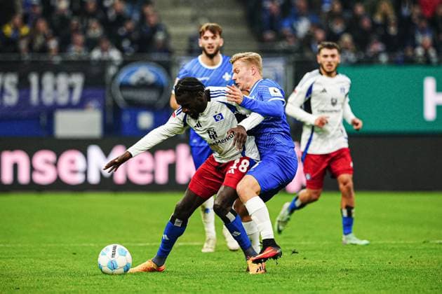 Bakery Jatta (Hamburger SV, 18), Andreas Mueller (SV Darmstadt 98, 16) GER, Hamburger SV vs. SV Darmstadt 98, Fussball, 2. Bundesliga, Spieltag 15, Saison 2024 2025, 08.12.2024 DFL REGULATIONS PROHIBIT ANY USE OF PHOTOGRAPHS AS IMAGE SEQUENCES AND OR QUASI-VIDEO GER, Hamburger SV vs. SV Darmstadt 98, Fussball, 2. Bundesliga, Spieltag 15, Saison 2024 2025, 08.12.2024 Hamburg