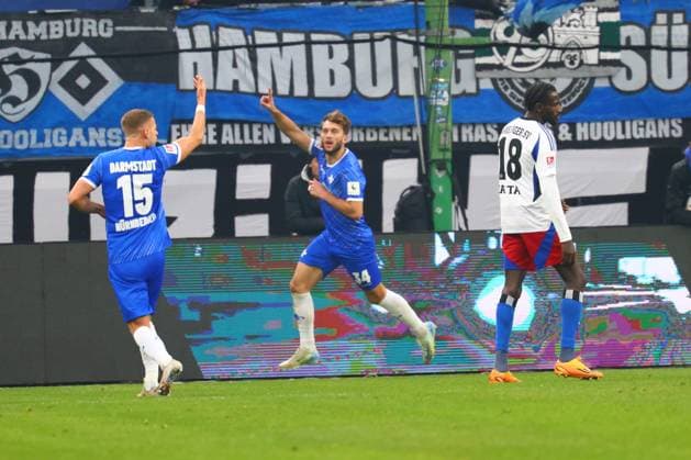 GER,Hamburg, Fussball, DFB, Hamburger SV vs SV Darmstadt 98 , im Hamburger Volksparkstadion , 08.12.2024 , v.l. Fabian Nuernberger ( SV Darmstadt 98 ) Killian Corredor ( SV Darmstadt 98 ) Torschuetze zum 2:2 DFL regulations prohibit any use of photographs as image sequences and or quasi-video.