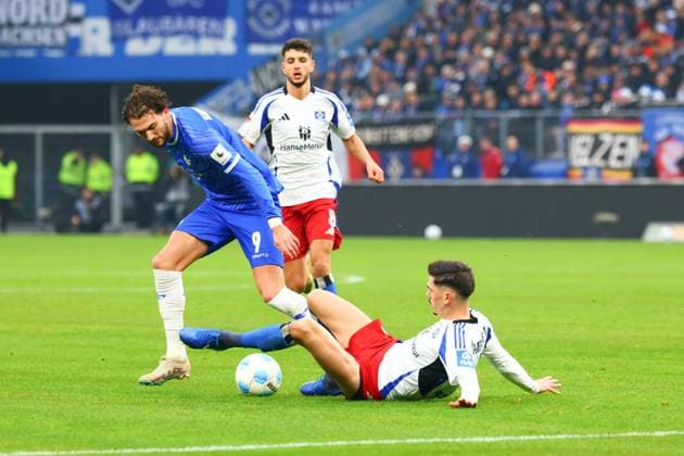 GER,Hamburg, Fussball, DFB, Hamburger SV vs SV Darmstadt 98 , im Hamburger Volksparkstadion , 08.12.2024 , v.l. Fraser Hornby ( SV Darmstadt 98 ) DFL regulations prohibit any use of photographs as image sequences and or quasi-video.