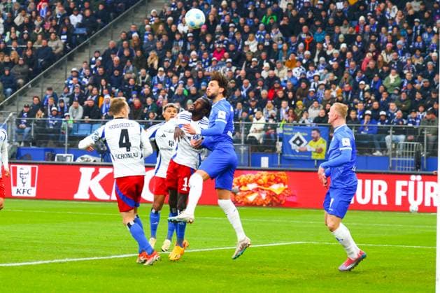 GER,Hamburg, Fussball, DFB, Hamburger SV vs SV Darmstadt 98 , im Hamburger Volksparkstadion , 08.12.2024 , v.l. Sebastian Schonlau (Hamburger SV) , Bakery Jatta (Hamburger SV) DFL regulations prohibit any use of photographs as image sequences and or quasi-video.