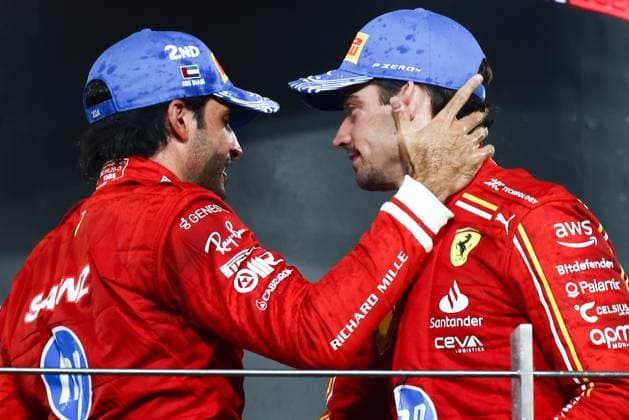 December 8, 2024, Abu Dhabi, United Arab Emirates: Carlos Sainz of Ferrari and Charles Leclerc of Ferrari celebrate on the podium during Formula 1 Abu Dhabi Grand Prix at Yas Marina Circuit on December 8th, 2024 in Abu Dhabi, United Arab Emirates. Abu Dhabi United Arab Emirates - ZUMAz156 0783737545st Copyright: xBeataxZawrzelx