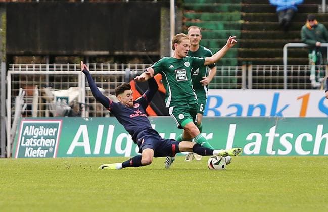 08.12.2024, xpfrx, Fussball Regionalliga Suedwest, FC Homburg - FSV Mainz 05 U23 emspor, v.l. David Mamutovic (Mainz), Maximilian Jansen (Homburg) (DFL DFB REGULATIONS PROHIBIT ANY USE OF PHOTOGRAPHS as IMAGE SEQUENCES and or QUASI-VIDEO) Homburg