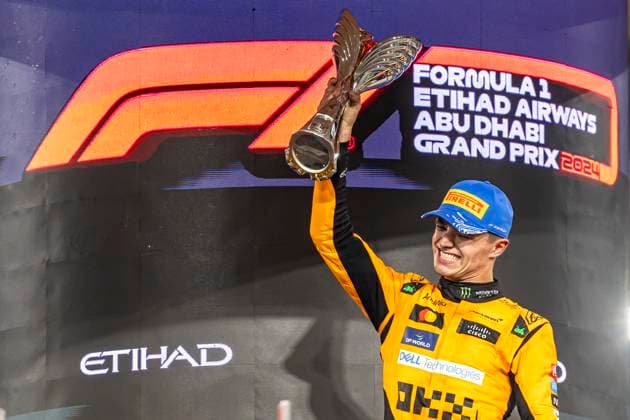 ABU DHABI, UNITED ARAB EMIRATES - DECEMBER 08: Race winner Lando Norris of Great Britain and McLaren celebrates on the podium during the F1 Grand Prix of Abu Dhabi at Yas Marina Circuit on December 08, 2024 in Abu Dhabi, United Arab Emirates. Abu Dhabi Yas Marina Circuit United Arab Emirates Copyright: xJustPictures.ch EdmundxSox jp-en-EuSpIm-so4_2024-ABUDHAB-F1_20241208_ESR33572