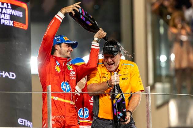 ABU DHABI, UNITED ARAB EMIRATES - DECEMBER 08: McLaren Chief Executive Officer Zak Brown and Second placed Carlos Sainz of Spain and Ferrari celebrate on the podium during the F1 Grand Prix of Abu Dhabi at Yas Marina Circuit on December 08, 2024 in Abu Dhabi, United Arab Emirates. Abu Dhabi Yas Marina Circuit United Arab Emirates Copyright: xJustPictures.ch EdmundxSox jp-en-EuSpIm-so4_2024-ABUDHAB-F1_20241208_ESR33687