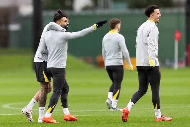 Football - UEFA Champions League - League Phase - Girona FC v Liverpool FC - MD-1 LIVERPOOL, ENGLAND - Monday, December 9, 2024: Liverpool s Mohamed Salah interacts with team-mate Darwin Nunez (obscured) and Curtis Jones (R) during a training session at the AXA Training Centre ahead of the UEFA Champions League match between Girona FC and Liverpool FC. (Photo by Jessica Hornby Propaganda) LIVERPOOL AXA Training Centre MERSEYSIDE ENGLAND  Copyright: xDavidxRawcliffex P2024-12-09-JH_LFC_Training_Girona-18