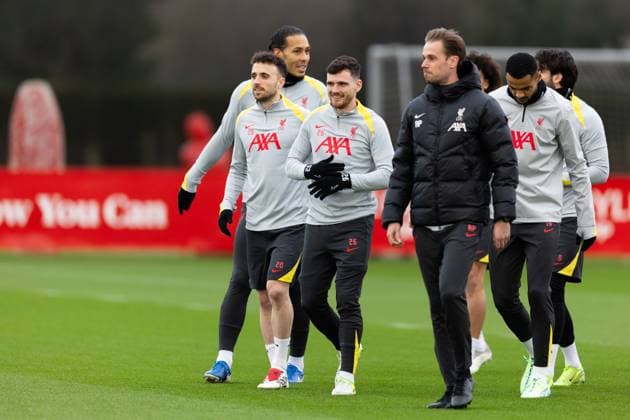 Football - UEFA Champions League - League Phase - Girona FC v Liverpool FC - MD-1 LIVERPOOL, ENGLAND - Monday, December 9, 2024: Liverpool s Diogo Jota (L) and Andy Robertson during a training session at the AXA Training Centre ahead of the UEFA Champions League match between Girona FC and Liverpool FC. (Photo by Jessica Hornby Propaganda) LIVERPOOL AXA Training Centre MERSEYSIDE ENGLAND  Copyright: xDavidxRawcliffex P2024-12-09-JH_LFC_Training_Girona-31