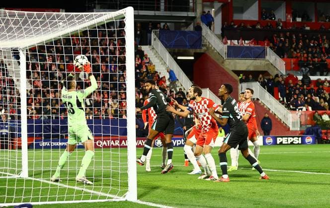 Paulo Gazzaniga of Girona saves a header from Joe Gomez of Liverpool early on Girona v Liverpool, UEFA Champions League, Group Stage, Football, Estadi Montilivi, Girona, Spain - 10 Dec 2024 EDITORIAL USE ONLY No use with unauthorised audio, video, data, fixture lists, club league logos or live services. Online in-match use limited to 120 images, no video emulation. No use in betting, games or single club league player publications. Copyright: xKieranxMcManus Shutterstockx 14984460o