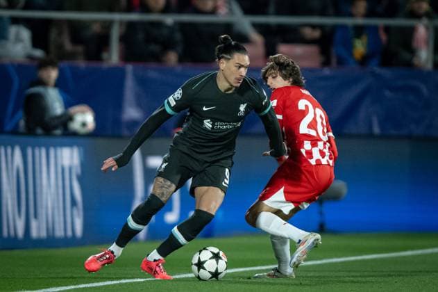Darwin Nunez (Liverpool FC) and Bryan Gil (Girona FC) battle for the ball during a UEFA Champions League match between Girona FC and Liverpool FC at Estadi Municipal de Montilivi in Girona, Girona, Spain, on December 10 2024. Photo by Felipe Mondino Copyright: x@FELIPExMONDINOx