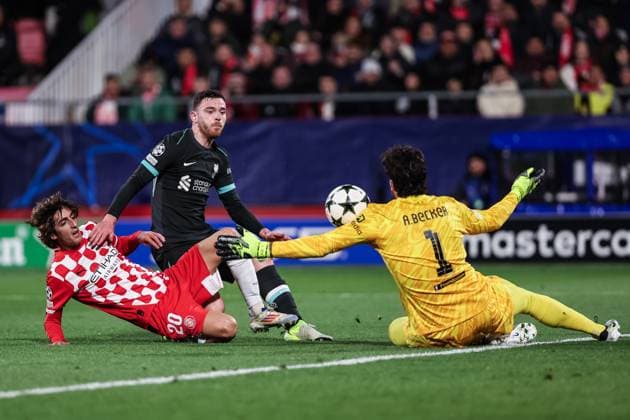 December 10, 2024, Girona, Girona, SPAIN: Bryan Gil of Girona FC, Andrew Robertson and Alisson Becker of Liverpool FC in action during the UEFA Champions League 2024 25 League Phase MD6, match between Girona FC and Liverpool FC at Estadi de Montilivi on December 10, 2024 in Girona, Spain. Girona SPAIN - ZUMAa181 20241210_zaa_a181_069 Copyright: xJavierxBorregox