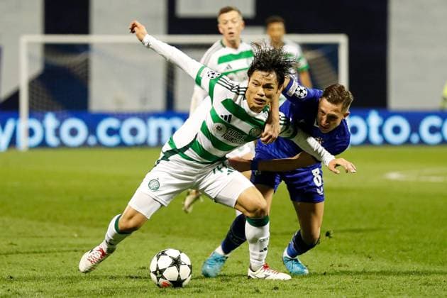 Reo Hatate of Celtic battles with Lukas Kacavenda of Dinamo Zagreb Dinamo Zagreb v Celtic, UEFA Champions League, Group Stage, Football, Maksimir Stadium, Zagreb, Croatia, UK - 10 Dec 2024 EDITORIAL USE ONLY No use with unauthorised audio, video, data, fixture lists, club league logos or live services. Online in-match use limited to 120 images, no video emulation. No use in betting, games or single club league player publications. Copyright: xNikolaxKrstic Shutterstockx 14984446cf
