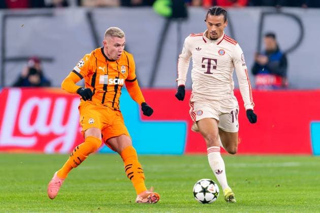 2024-12-10 FC Shakhtar Donetsk v FC Bayern Munchen - UEFA Champions League 2024 25 League Phase MD6 GELSENKIRCHEN, GERMANY - DECEMBER 10: Oleksandr Zubkov of FC Shakhtar Donetsk battles for the ball with Leroy Sane of FC Bayern Munchen during the UEFA Champions League 2024 25 League Phase MD6 match between FC Shakhtar Donetsk and FC Bayern Munchen at Arena AufSchalke on December 10, 2024 in Gelsenkirchen, Germany. (Photo by Joris Verwijst BSR Agency) Gelsenkirchen Germany Content not available for redistribution in The Netherlands directly or indirectly through any third parties. Copyright: xBSRxAgencyx