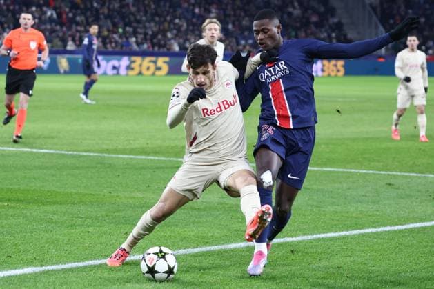 SOCCER - UEFA CL, RBS vs PSG SALZBURG,AUSTRIA,10.DEC.24 - SOCCER - UEFA Champions League, Red Bull Salzburg vs Paris Saint German. Image shows Nicolas Capaldo (RBS) and Nuno Mendes (PSG).  GEPAxpictures xDavidxGeieregger