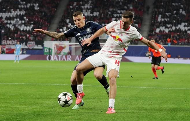 Lucas Digne, Christoph Baumgartner Zweikampf Spielszene Aktion Fußball Fussball UEFA Champions League UCL Herren 6. Spieltag Saison 2024 2025 10.12.2024 Rasen Ballsport RB Leipzig RBL vs Aston Villa DFL regulations prohibit any use of photographs as image sequences and or quasi-video.