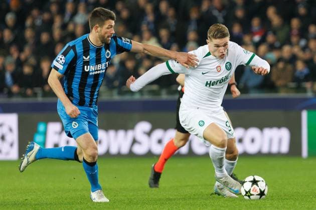 Club s Brandon Mechele and Sporting s Viktor Gyokeres fight for the ball during a soccer game between Belgian Club Brugge KV and Portuguese club Sporting CP, Tuesday 10 December 2024 in Brugge, on the sixth day of the UEFA Champions League league phase. KURTxDESPLENTER  x107896251x