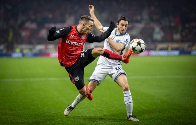 Leverkusen, Germany. 10th Dec 2024. Alejandro Grimaldo (LEV) Matteo Darmian (Inter) Bayer Leverkusen - Inter Mailand 10.12.2024