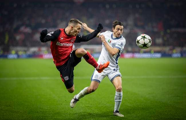 Leverkusen, Germany. 10th Dec 2024. Alejandro Grimaldo (LEV) Matteo Darmian (Inter) Bayer Leverkusen - Inter Mailand 10.12.2024