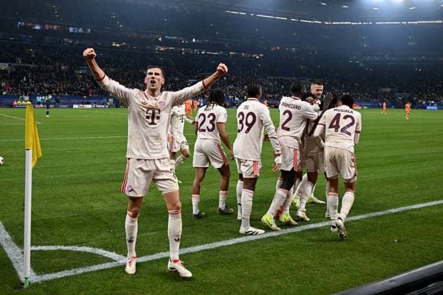10.12.2024, xsltx, Fussball UEFA Champions League, Schachtar Donezk - FC Bayern München emspor, v.l. Torjubel nach dem Tor zum celebrating the goal celebrate 1:5 durch Michael Olise (FC Bayern Muenchen) (DFL DFB REGULATIONS PROHIBIT ANY USE OF PHOTOGRAPHS as IMAGE SEQUENCES and or QUASI-VIDEO) Gelsenkirchen