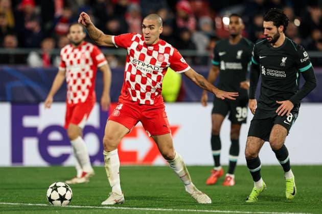 Girona, Spain, October 22nd 2024: Oriol Romeu i Vidal (14 Girona FC) and Dominik Szoboszlai (8 Liverpool FC) in action during the UEFA Champions League football match between Girona FC and Liverpool FC at the Montilivi Stadium in Girona, Spain (Judit Cartiel SPP) Copyright: xJuditxCartielx xSPPx spp-en-JuCaSp-JUCA1365