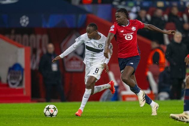 SOCCER - UEFA CL, Lille vs Sturm LILLE,FRANCE,11.DEC.24 - SOCCER - UEFA Champions League, OSC Lille vs SK Sturm Graz. Image shows Malick Yalcouye (Sturm) and Alexsandro (Lille).  GEPAxpictures xAvnixRetkoceri