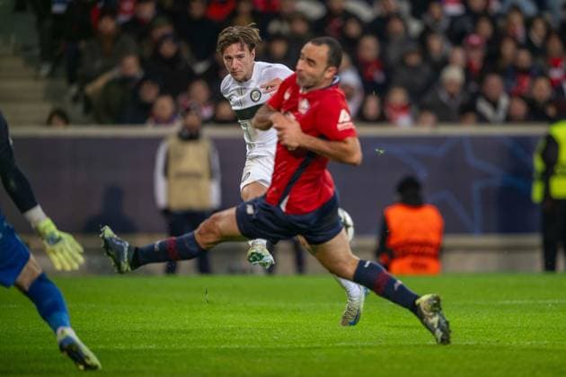 SOCCER - UEFA CL, Lille vs Sturm LILLE,FRANCE,11.DEC.24 - SOCCER - UEFA Champions League, OSC Lille vs SK Sturm Graz. Image shows William Boeving (Sturm) and Ismaily (Lille).  GEPAxpictures xAvnixRetkoceri