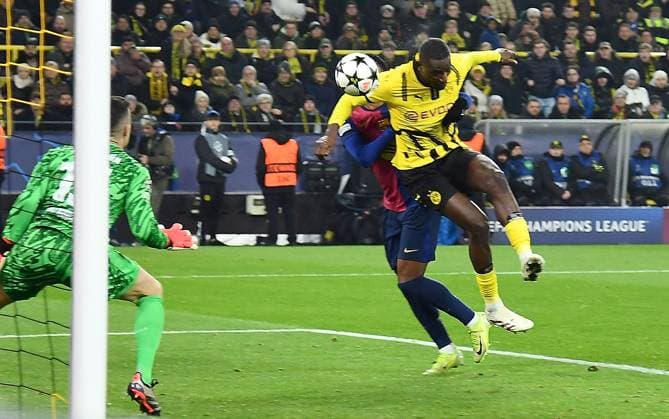 11.12.2024, xhbx, Fussball UEFA Champions League, Borussia Dortmund - FC Barcelona, Barca emspor, v.l. Marc-Andre ter Stegen (FC Barcelona), Serhou Guirassy (Borussia Dortmund) (DFL DFB REGULATIONS PROHIBIT ANY USE OF PHOTOGRAPHS as IMAGE SEQUENCES and or QUASI-VIDEO) Dortmund