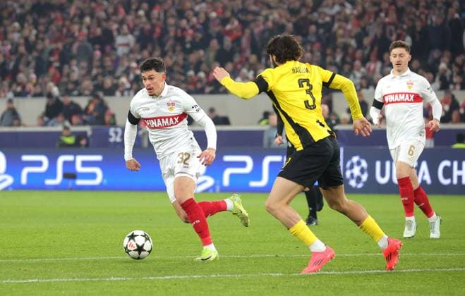 11.12.2024, Deutschland, Stuttgart, Fußball Champions League, VfB Stuttgart vs. Young Boys Bern, v.l. Fabian Rieder (VfB), Jaouen Hadjam (YB)