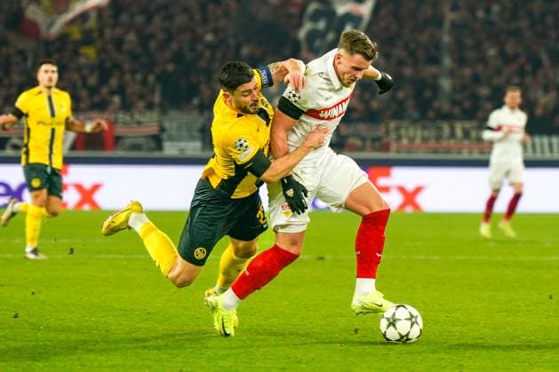 Sport Bilder des Tages Fussball UEFA Champions League 2024 2025, 6. Spieltag - VfB Stuttgart vs. BSC Young Boys Bern YB - Stuttgart Arena: Ermedin Demirovic (VfB Stuttgart, 09) mit Loris Benito (BSC Young Boys, 23) Copyright: xJOERANxSTEINSIEKx