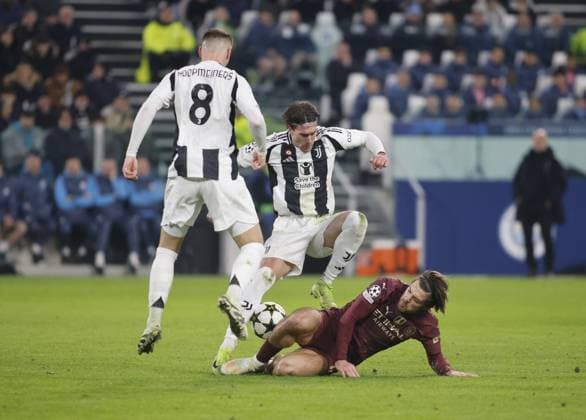 CALCIO - UEFA Champions League - Juventus FC vs Manchester City Dusan Vlahovic of Juventus FC and Jack Grealish of Manchester City during the Uefa Champions League 2024 25, football match between Juventus FC and Manchester City, on 11 December 2024, at Allianz Stadium Turin Italy. Photo Nderim Kaceli Turin Italy  Copyright: xIPAxSport ABACAx