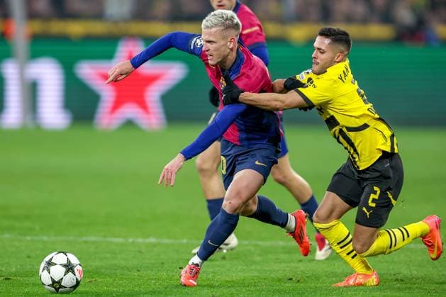 11.12.2024, UEFA Champions League, Borussia Dortmund - FC Barcelona, Barca 8. Spieltag, Signal Iduna Park, Saison 2024 2025: Yan Couto (BVB 2) im Zweikampf gegen Dani Olmo (Barca 20) Nordrhein-Westfalen Deutschland