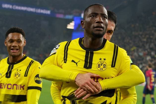 Dortmund, Deutschland 11. Dezember 2024: Champions League - 2024 2025 - Borussia Dortmund vs. FC Barcelona, Barca Im Bild: v.li. der Zweite Torschütze Serhou Guirassy (BVB) jubelt nach seinem Tor zum 1:1 mit Emre Can (BVB) Signal Iduna Park Nordrhein Westfalen Copyright: xFotostandx xFantinix