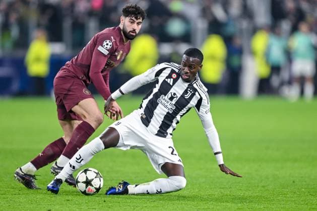 Josko Gvardiol (Manchester City) und Timothy Weah (Juventus) battle for the ball during the UEFA Champions League 2024 25 League Phase MD6 match between Juventus and Manchester City at Allianz Stadium on December 11, 2024 in Turin, Italy. Defodi-541_JUVMAN20241211_106