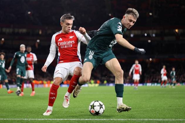 Arsenal v Monaco 11 December 2024, London - UEFA Champions League - Arsenal v Monaco - Leandro Trossard of Arsenal and Aleksandr Golovin of Monaco - Photo: Jacques Feeney Offside. London UK Copyright: xJacquesxFeeneyx xOffsidexOffside
