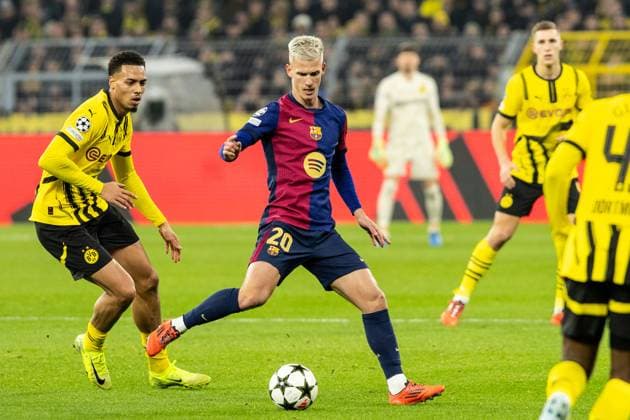 UEFA Champions League: Borussia Dortmund - Barcelona; 11.12.2024 Felix Nmecha (Borussia Dortmund, 8), Dani Olmo (Barcelona, 20) UEFA Champions League: Borussia Dortmund - Barcelona; Signal Iduna Park, Dortmund; 11.12.2024 Copyright: xBEAUTIFULxSPORTS Buriakovx