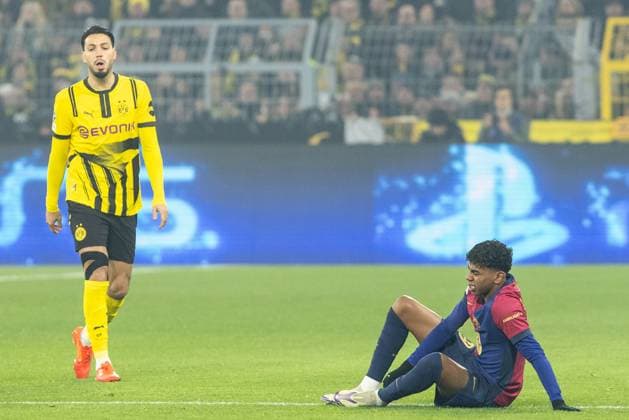 UEFA Champions League: Borussia Dortmund - Barcelona; 11.12.2024 Lamine Yamal (Barcelona, 19) sitz auf dem Rasen nach dem Faul. UEFA Champions League: Borussia Dortmund - Barcelona; Signal Iduna Park, Dortmund; 11.12.2024 Copyright: xBEAUTIFULxSPORTS Buriakovx