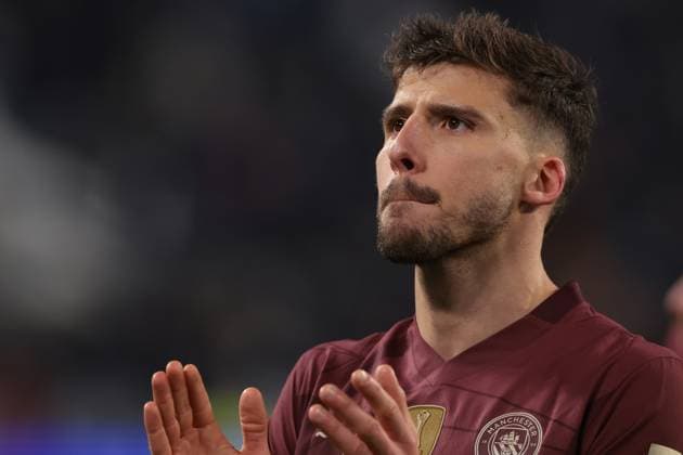 Turin, Italy, 11th December 2024. A dejected Ruben Dias of Manchester City applauds the fans following the final whistle of the UEFA Champions League match at Juventus Stadium, Turin. Picture credit should read: Jonathan Moscrop Sportimage EDITORIAL USE ONLY. No use with unauthorised audio, video, data, fixture lists, club league logos or live services. Online in-match use limited to 120 images, no video emulation. No use in betting, games or single club league player publications. SPI-3517-0128