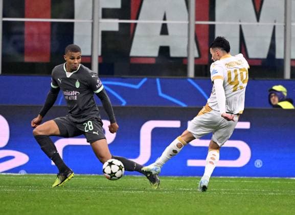 (241212) -- MILAN, Dec. 12, 2024 -- Crvena Zvezda s Nemanja Radonjic (R) scores during the UEFA Champions League match between AC Milan and Crvena Zvezda in Milan, Italy, Dec. 11, 2024. (Photo by Alberto Lingria Xinhua) (SP)ITALY-MILAN-FOOTBALL-UEFA CHAMPIONS LEAGUE- AC MILAN VS CRVENA ZVEZDA LixJing 