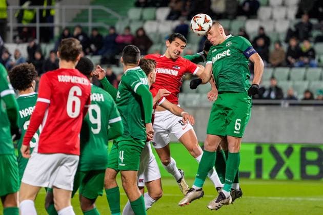 2024-12-12 Ludogorets v AZ Alkmaar - UEFA Europa League 2024 25 League Phase MD6 RAZGRAD, BULGARIA - DECEMBER 12: Alexandre Penetra of AZ and Jakub Piotrowski of Ludogorets battle for possession during a UEFA Europa League 2024 25 League Phase MD6 match between Ludogorets and AZ Alkmaar at Huvepharma Arena on December 12, 2024 in Razgrad, Bulgaria. Razgrad Huvepharma Arena Bulgaria Content not available for redistribution in The Netherlands directly or indirectly through any third parties. Copyright: xEdxvanxdexPolx