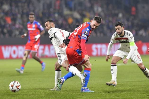 (L-R) Noussair Mazraoui of Manchester, Svetozar Markovic of Plzen and Bruno Fernandes of Manchester in action during the football Europa League 6th round match Viktoria Plzen vs Manchester United, ManU in Pilsen, Czech Republic, December 12, 2024. (CTKxPhoto MiroslavxChaloupka) CTKPhotoP2024121206863  CTKPhotoP2024121206863