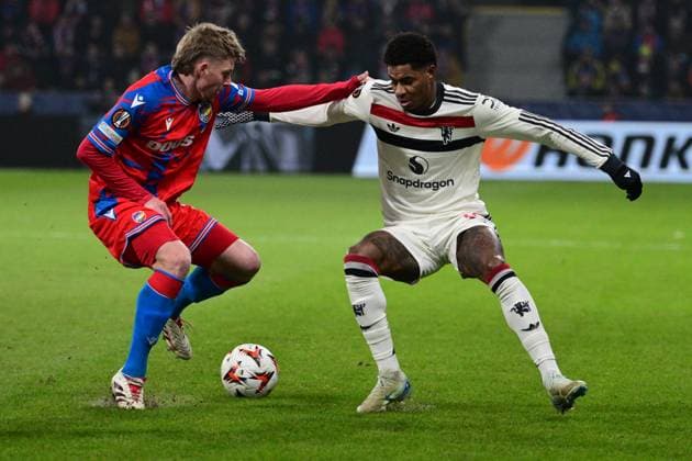 Pavel Sulc of Plzen, left, and Marcus Rashford of Manchester in action during the football Europa League 6th round match Viktoria Plzen vs Manchester United, ManU in Pilsen, Czech Republic, December 12, 2024. (CTKxPhoto MichalxKamaryt) CTKPhotoP2024121206958  CTKPhotoP2024121206958