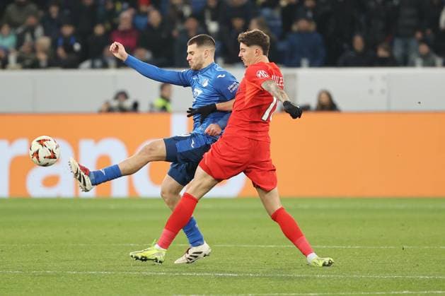 12.12.2024, xtvx, Fussball UEFA Europa League, TSG 1899 Hoffenheim - FCSB Bukarest emspor, v.l. Zweikampf, Duell, duel, tackle, compete David Jurasek (TSG 1899 Hoffenheim) David Miculescu (FC Steaua Bukarest) (DFL DFB REGULATIONS PROHIBIT ANY USE OF PHOTOGRAPHS as IMAGE SEQUENCES and or QUASI-VIDEO) Sinsheim