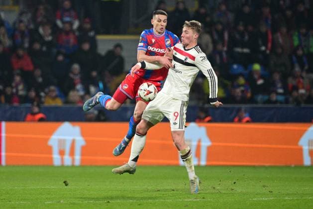 Svetozar Markovic of Plzen, left, and Rasmus Hojlund of Manchester in action during the football Europa League 6th round match Viktoria Plzen vs Manchester United, ManU in Pilsen, Czech Republic, December 12, 2024. (CTKxPhoto MichalxKamaryt) CTKPhotoP2024121207892  CTKPhotoP2024121207892