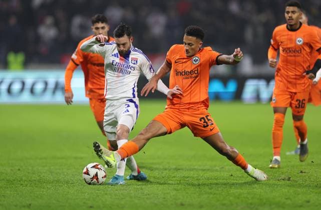 12.12.2024, Fussball UEFA Europa League, Olympique Lyon - Eintracht Frankfurt, emonline, emspor, v.l., Nicolas Tagliafico (Olympique Lyon), Tuta Lucas Silva Melo (Eintracht Frankfurt) DFL DFB REGULATIONS PROHIBIT ANY USE OF PHOTOGRAPHS AS IMAGE SEQUENCES AND OR QUASI-VIDEO. xdcx Copyright: HMBxMedia Claus
