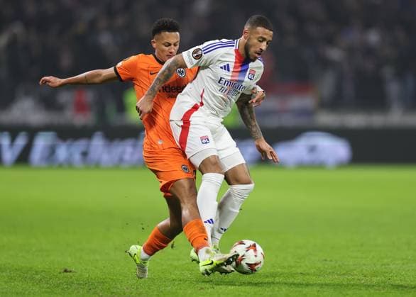 12.12.2024, Fussball UEFA Europa League, Olympique Lyon - Eintracht Frankfurt, emonline, emspor, v.l., Tuta Lucas Silva Melo (Eintracht Frankfurt), Corentin Tolisso (Olympique Lyon) DFL DFB REGULATIONS PROHIBIT ANY USE OF PHOTOGRAPHS AS IMAGE SEQUENCES AND OR QUASI-VIDEO. xdcx Copyright: HMBxMedia Claus