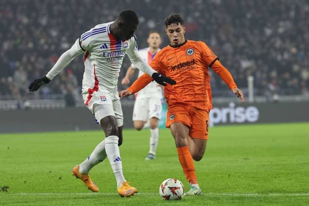 2024.12.12 6. Spieltag UEFA Europa League Olympique Lyonnais Eintracht Frankfurt v.l., Moussa NiakhatÃ (Olympique Lyonnais), Fares Chaibi (Eintracht Frankfurt), Zweikampf, Action, Aktion, Battles for the Ball (DFL REGULATIONS PROHIBIT ANY USE OF PHOTOGRAPHS AS IMAGE SEQUENCES AND OR QUASI-VIDEO) Copyright: JoaquimxFerreira