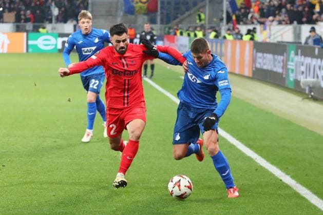 12.12.2024, xtvx, Fussball UEFA Europa League, TSG 1899 Hoffenheim - FCSB Bukarest emspor, v.l. Zweikampf, Duell, duel, tackle, compete Valentin Cretu (FC Steaua Bukarest) Andrej Kramaric (TSG 1899 Hoffenheim) (DFL DFB REGULATIONS PROHIBIT ANY USE OF PHOTOGRAPHS as IMAGE SEQUENCES and or QUASI-VIDEO) Sinsheim