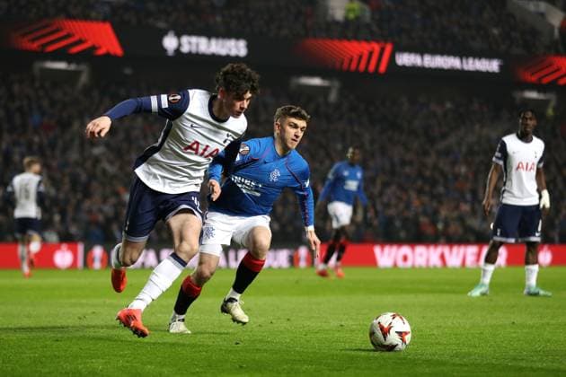 Archie Gray of Tottenham Hotspur and Ridvan Yilmaz of Rangers during the Europa League group phase match at Ibrox Stadium, Glasgow. Rangers v Tottenham Hotspur, UEFA Europa League, Football, Ibrox Stadium, Glasgow, Scotland, UK - 12 Dec 2024 EDITORIAL USE ONLY No use with unauthorised audio, video, data, fixture lists, club league logos or live services. Online in-match use limited to 120 images, no video emulation. No use in betting, games or single club league player publications. Copyright: xKirkxO Rourke RangersxFC Shutterstockx 14998166v