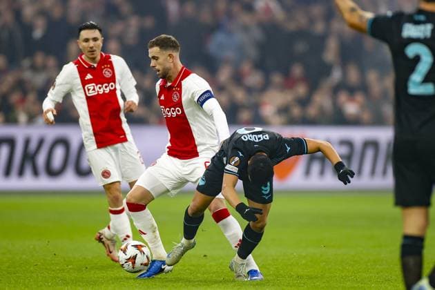 AMSTERDAM, 12-12-2024 , JohanCruyff Arena, Europa League Football, Ajax - Lazio Roma. Ajax player Jordan Henderson and Lazio Roma player Pedro Rodr™guez Ajax - Lazio Roma  x27001834x Copyright: